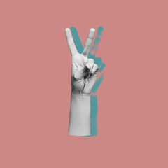 Female hand showing a peace gesture isolated on a rose pink color background. Trendy abstact collage in magazine urban style. Contemporary art. Modern design. Victory hand sign