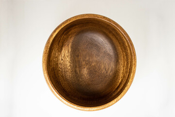 Wooden fruit plate isolated on white background