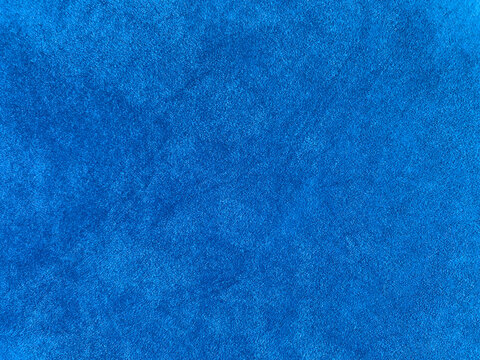 Light blue velvet fabric texture used as background. Empty light blue fabric background of soft and smooth textile material. There is space for text....