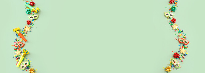 Holidays image of party colorful objects over green background. view from above