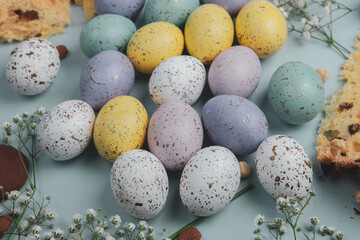 Hand painted pastel colored Easter eggs background. Happy Easter greeting card or invitation.