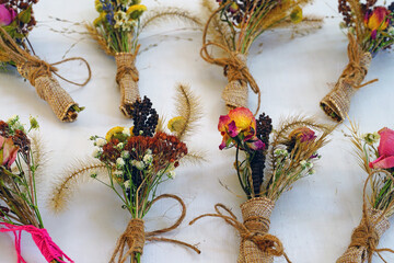 Mini dried flower bouquets tied with twine
