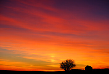 Old House Homestead and Tree in Winter Sunset Silhouette