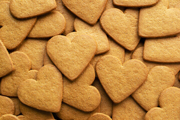 Pepper heart shaped cookies background, top view 