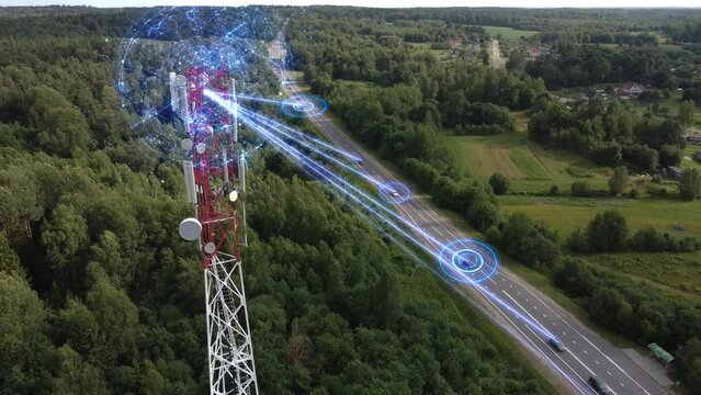 Aerial view of a telecommunications antenna transmitting signals and collecting information about electronic smart self-driving cars. Concept:Car Scan, GPS Tracking, Smart Roads, IoT, Traffic Control