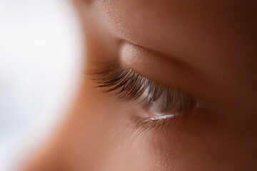 Baby's eyelashes. Macro photo. Soft focus, blurry background.
