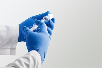 A doctor holds vaccine against new covid-19 variant. New generation vaccine against Coronavirus