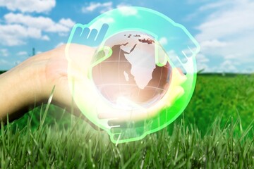Eliminate waste and pollution. Circular economy concept. Hand with globe