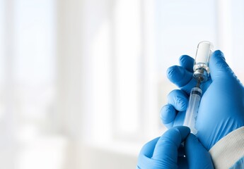 A doctor holds vaccine against new covid-19 variant. New generation vaccine against Coronavirus