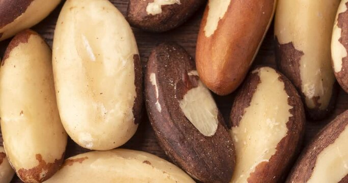 Closeup top view of brazil nuts. Food backdrop