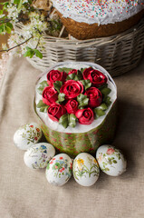 Easter cake with eggs on the festive table close-up top view