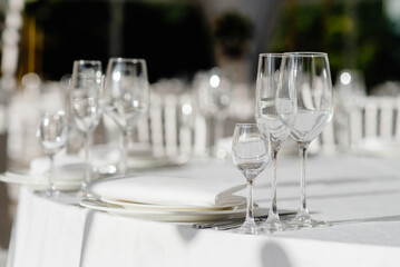 Empty glasses in restaurant. Table setting for celebration