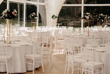 Beautiful flowers on the table on the wedding day