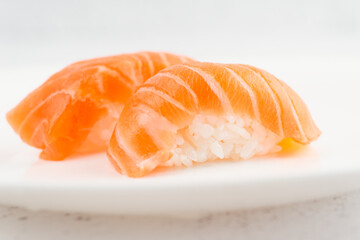 Salmon sushi shot in plate