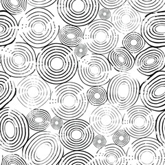 Fototapeta premium Seamless pattern with grunge circles. Black and white hand drawn vector illustration.