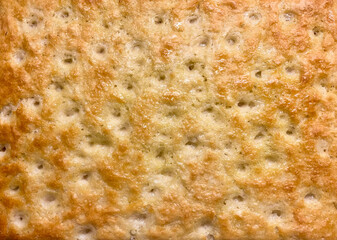Ligurian focaccia with classic holes