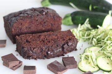 Zucchini chocolate cake slices. Moist double chocolate cake with grated zucchini, coco powder, chocolate and chocolate chips