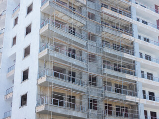 Residential building under construction on a sunny day