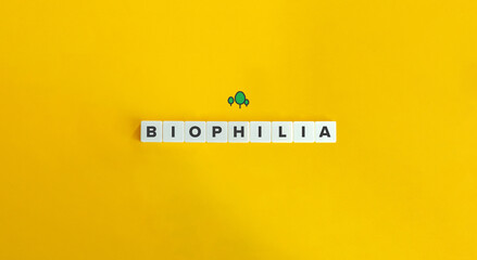 Biophilia Word on Letter Tiles on Yellow Background. Minimal Aesthetics.