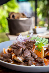 Flank steak, chilaquiles and bread for a nutritious and delicious breakfast