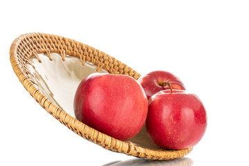 Three ripe red apples with ceramic dish, macro, isolated on white background.