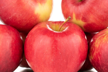 Fototapeta na wymiar Several ripe red apples, macro, isolated on a white background.