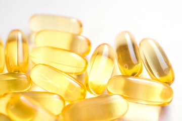 omega 3 vitamins yellow capsules close