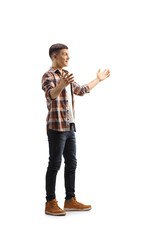 Full length profile shot of a casual young man waiting with arms wide open