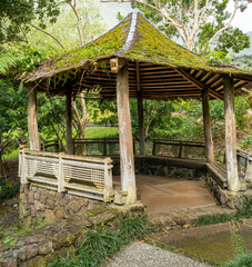 gazebo in the forest for use as a cover photo.