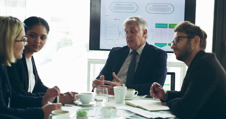 Same goal, different points of view. 4k video footage of a group of businesspeople having a meeting in the boardroom.