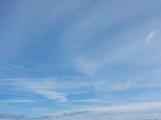 Fluffy white clouds and blue sky