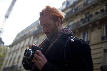Photographer shooting in the city centre of Paris