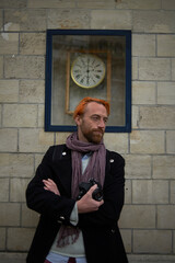 Portrait of a photographer posing in Paris