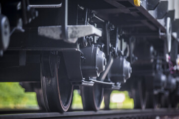 Close-up on a Train Car Undercarriage, passenger train, freight train