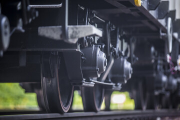 Close-up on a Train Car Undercarriage, passenger train, freight train © Marcin Kilarski/Wirestock