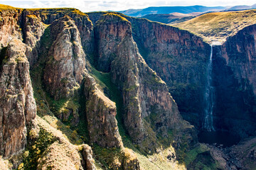 Travel to Lesotho. A view of Maletsunyane Waterfall and the cliffs surrounding the canyon