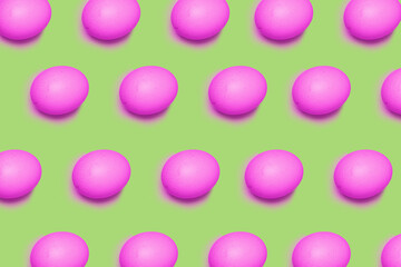 Happy Easter. Collection of random color pattern eggs on green background.