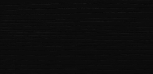Black wooden background with a dark wood texture