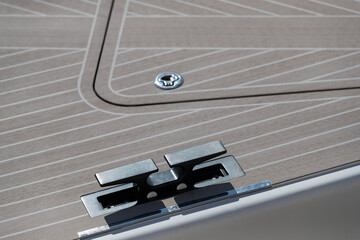 Close up view of front part of the boat at sunny day, bow of the boat, forepeak, hooks for a cable,...