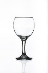 Empty glass wine glass on a white background