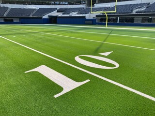 American football field, empty, no crowd with yard line numbers. 10 yard line.