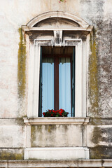 Fototapeta na wymiar Balcony with potted plantVenice, Italy