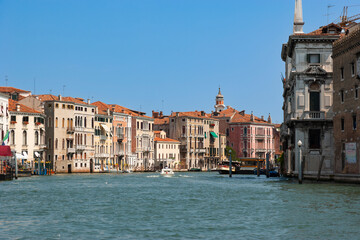 Buildings, boats, and gondolas in The Grand Canal, Venice, Italy