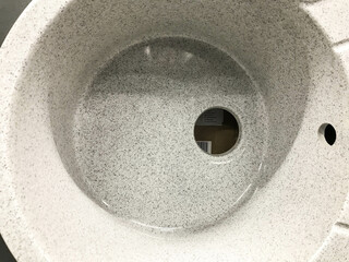 sink without faucet and drainage pipes. concrete sink with holes for water supply and drainage....