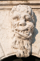 Grotesque Face of a monster sculpture on Santa Formosa Church, Venice, Italy