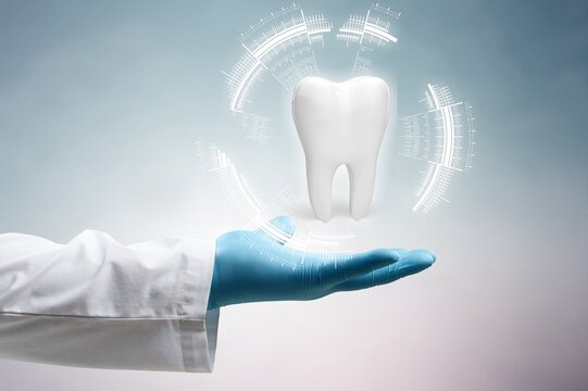 The Dentist Looks At The Hologram Of The Tooth. Concept For Innovative Technologies, Medicine Of The Future, Tooth Snapshot.