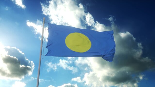 Republic of Palau flag waving at wind against beautiful blue sky. 3d rendering