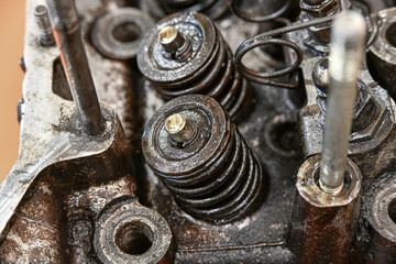 Valve springs in the disassembled cylinder head.