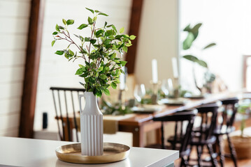 The table was set for dinner in the background out of focus