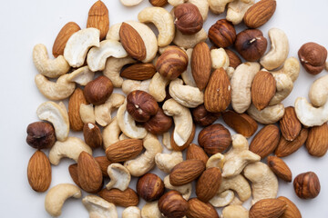 Various nuts on a white background close-up.